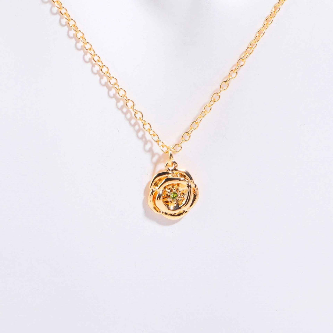 Birthstone bracelet with flower charm and cubic zirconia pendant