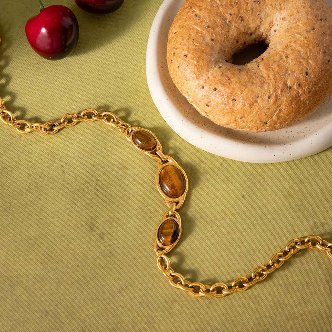 18K gold-plated, lightweight, and luxurious titanium steel necklace with tiger's eye stone.