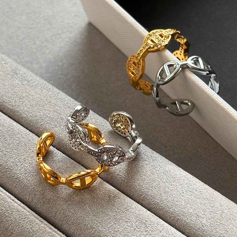 Gold and silver colored pig nose design open ring with full rhinestones for the index finger.
