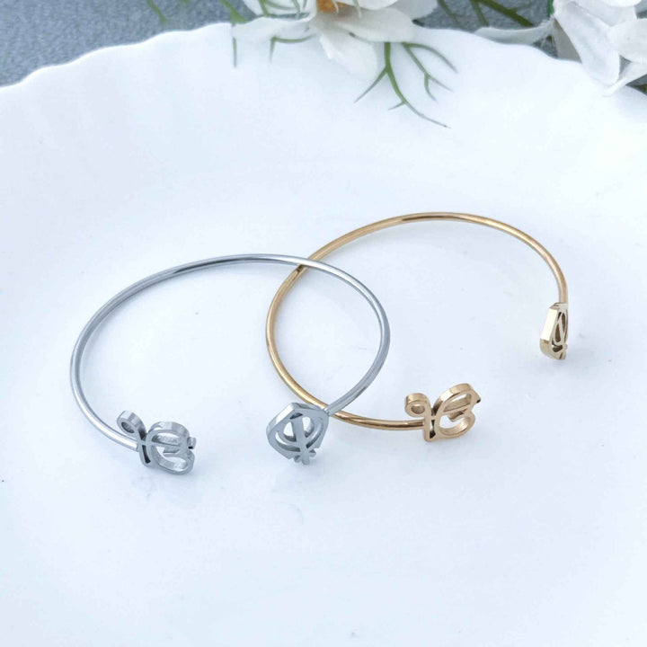 18K gold open-design smooth bangle bracelet