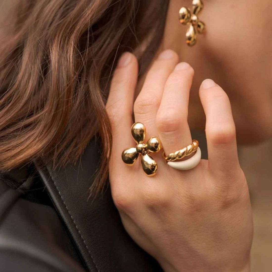 Light luxury, high-end titanium steel rings and earrings with unique designs.