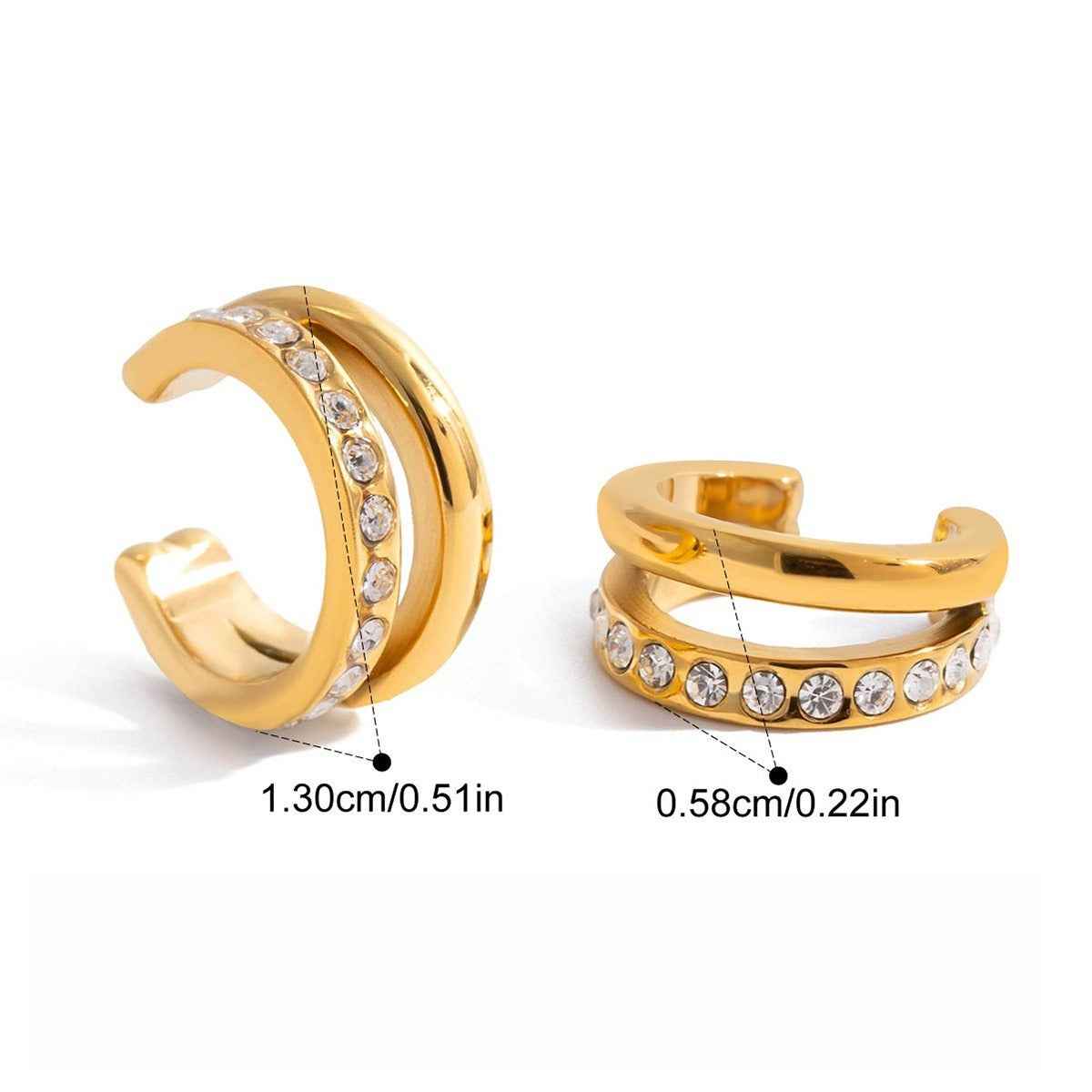 18K gold earrings inlaid with cubic zirconia in a teardrop design.