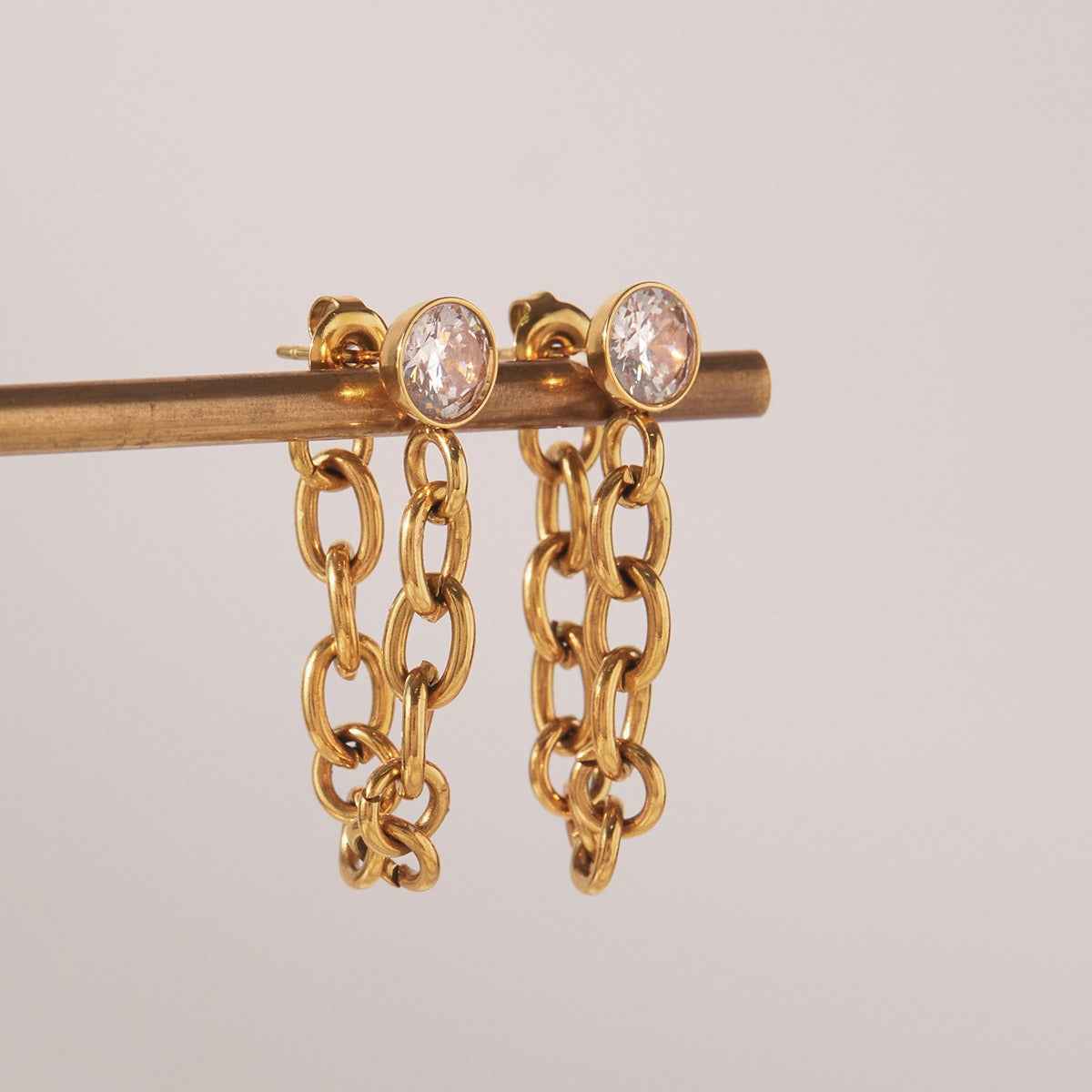 18K gold lightweight luxury earrings with zircon and tassel design.