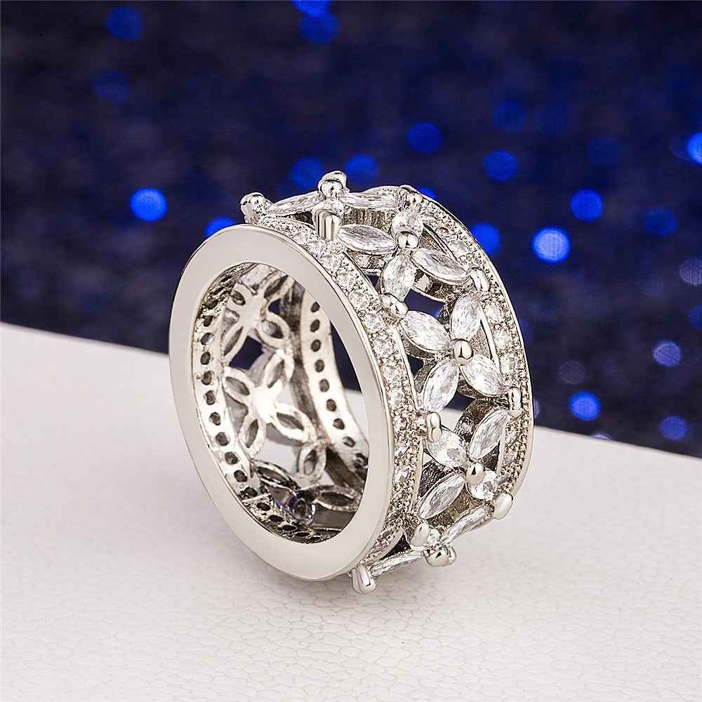S925 sterling silver ring with full pave-set marquise-cut stones.