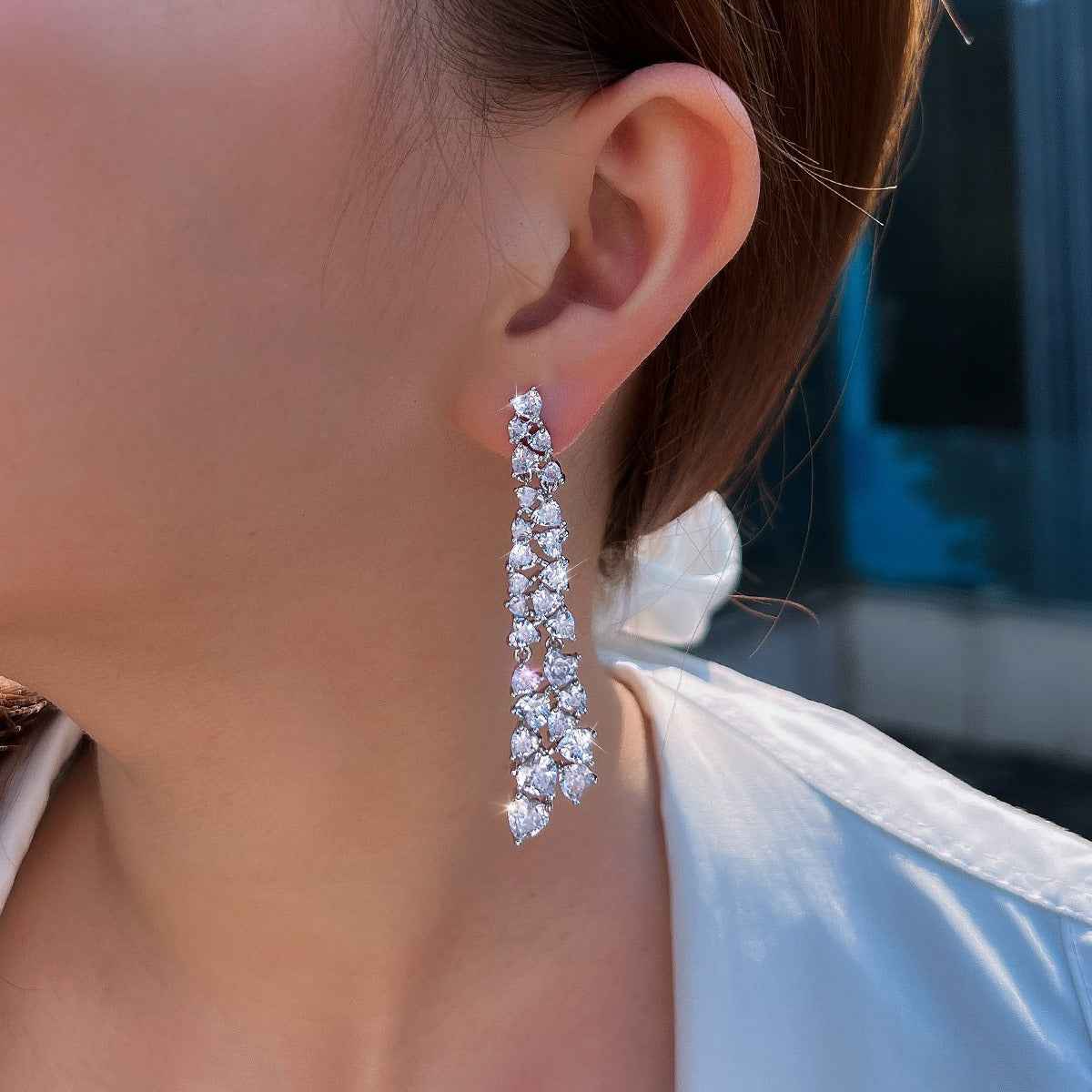 Long tassel earrings with full diamond embellishments