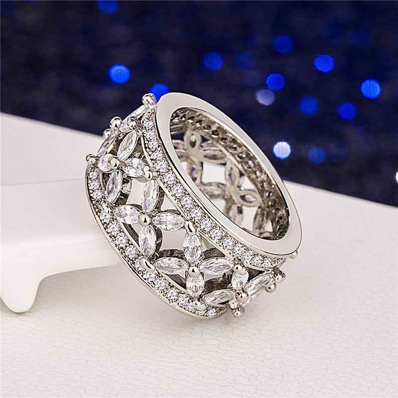 S925 sterling silver ring with full pave-set marquise-cut stones.