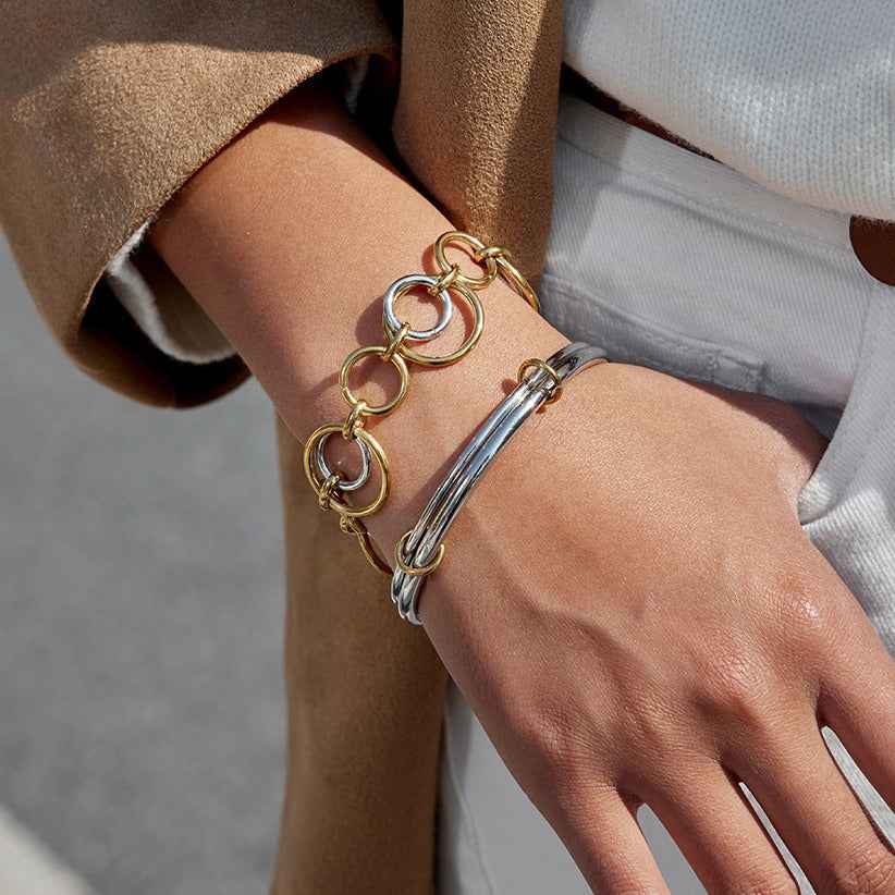 18K gold and S925 silver multi-strand bracelet with contrasting colors.