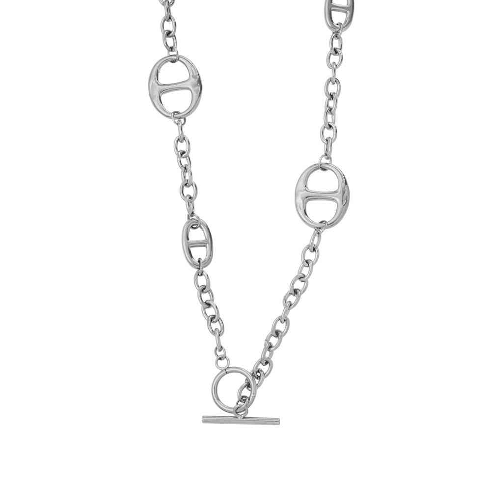 18K gold geometric-shaped necklace, bracelet, and earrings set.