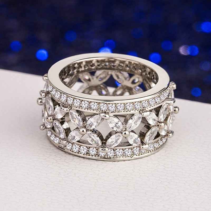 S925 sterling silver ring with full pave-set marquise-cut stones.