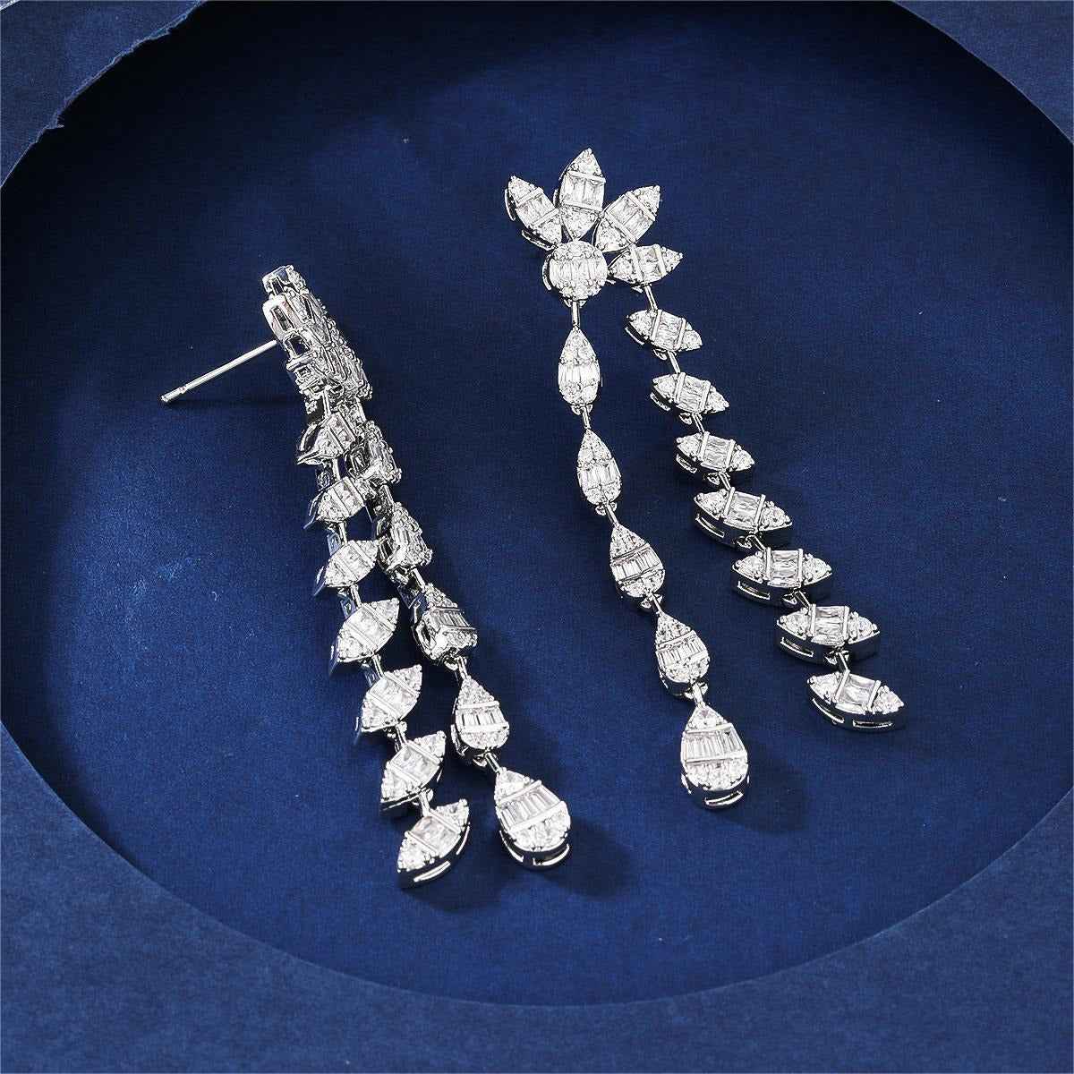 Double chain leaf-shaped earrings with full diamond embellishments