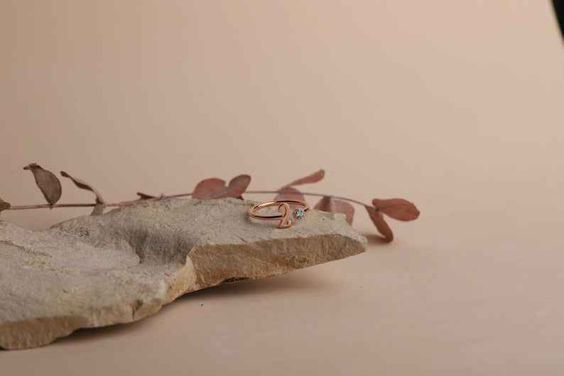 Personalized open ring with birthstones in the shape of numbers and letters