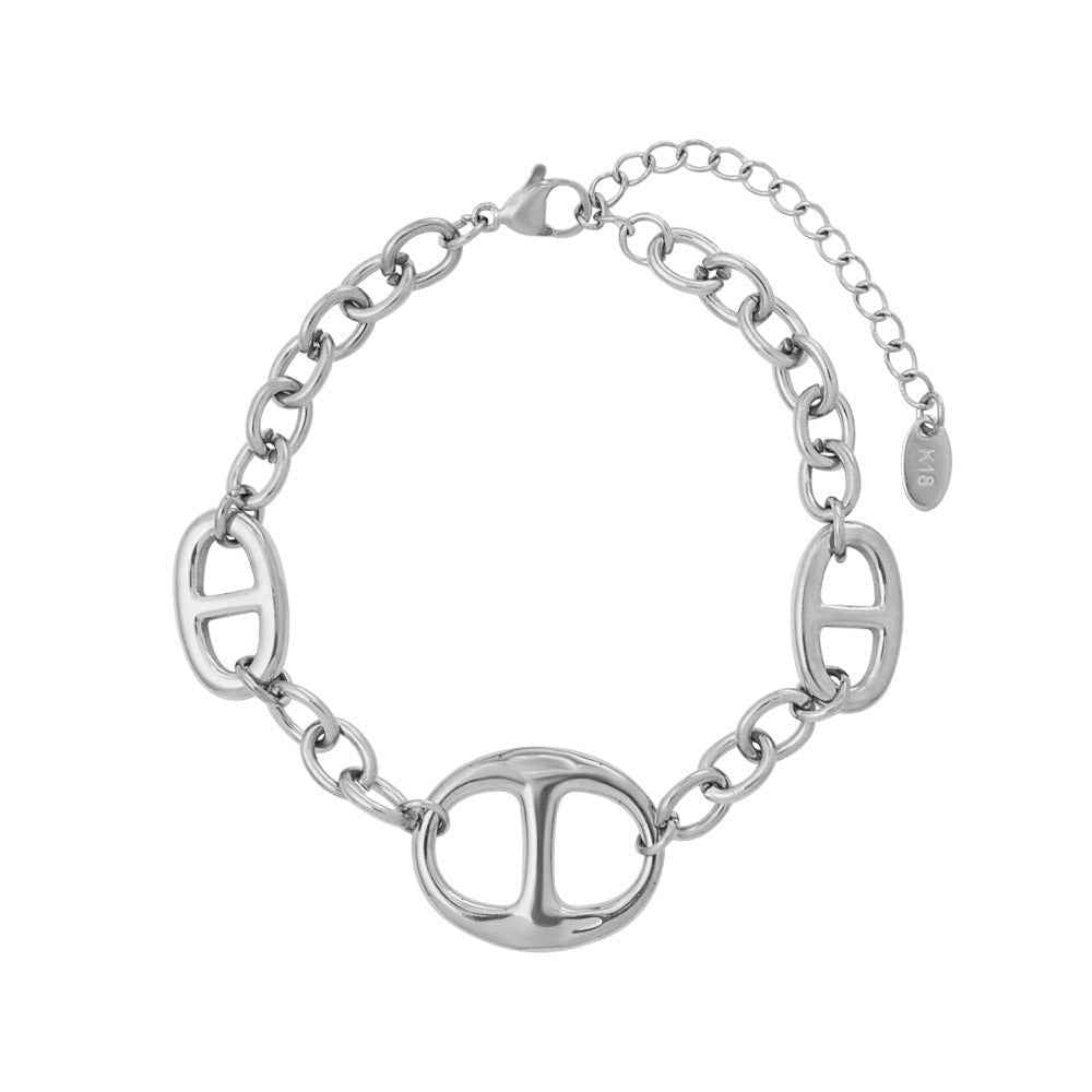 18K gold geometric-shaped necklace, bracelet, and earrings set.