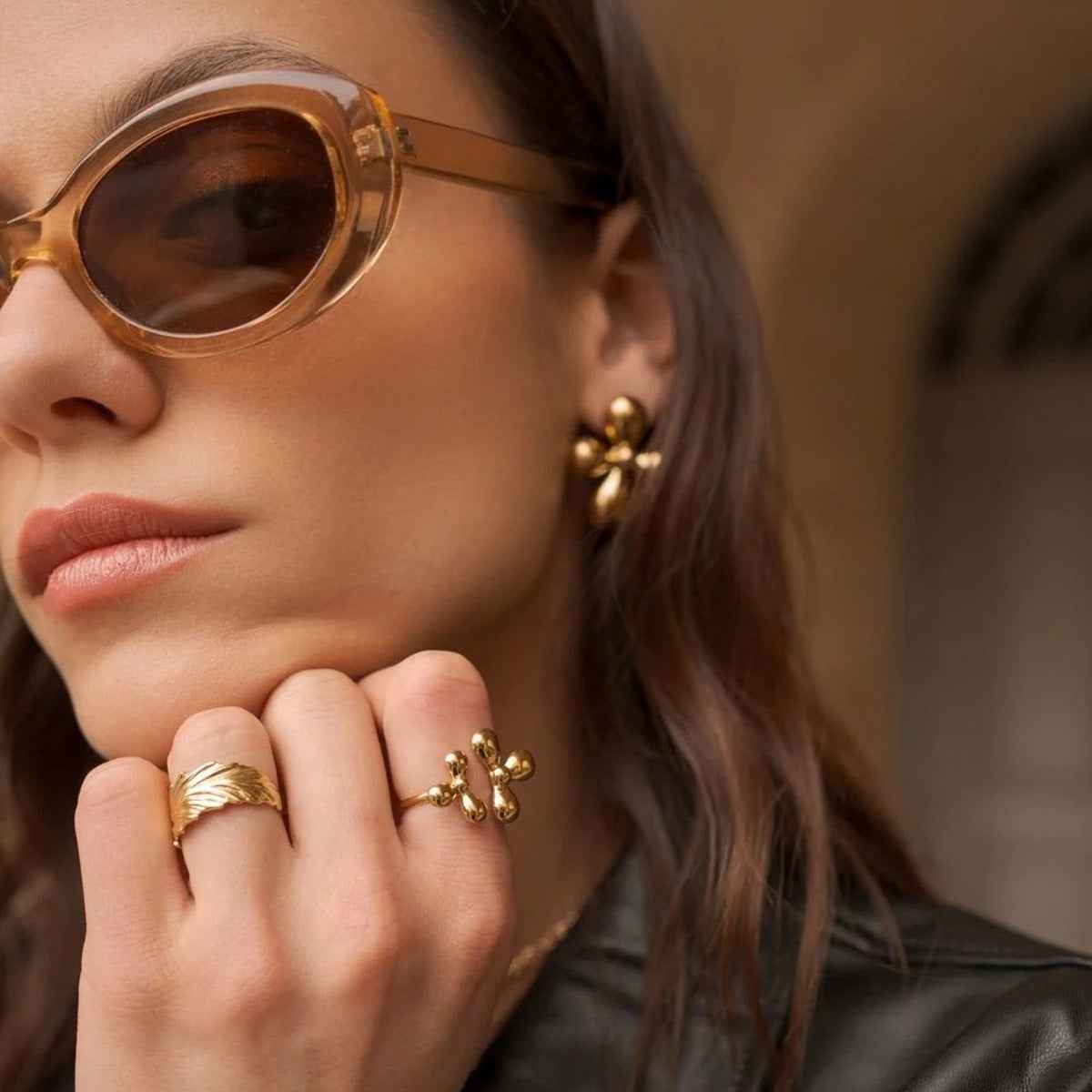 Light luxury, high-end titanium steel rings and earrings with unique designs.