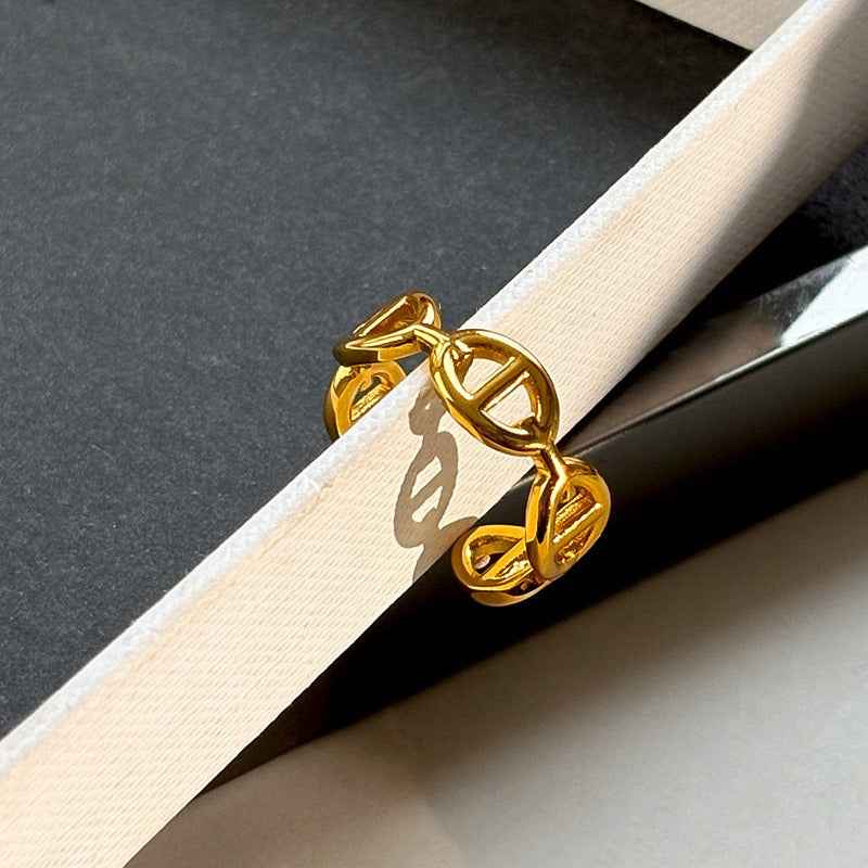 Gold and silver colored pig nose design open ring with full rhinestones for the index finger.