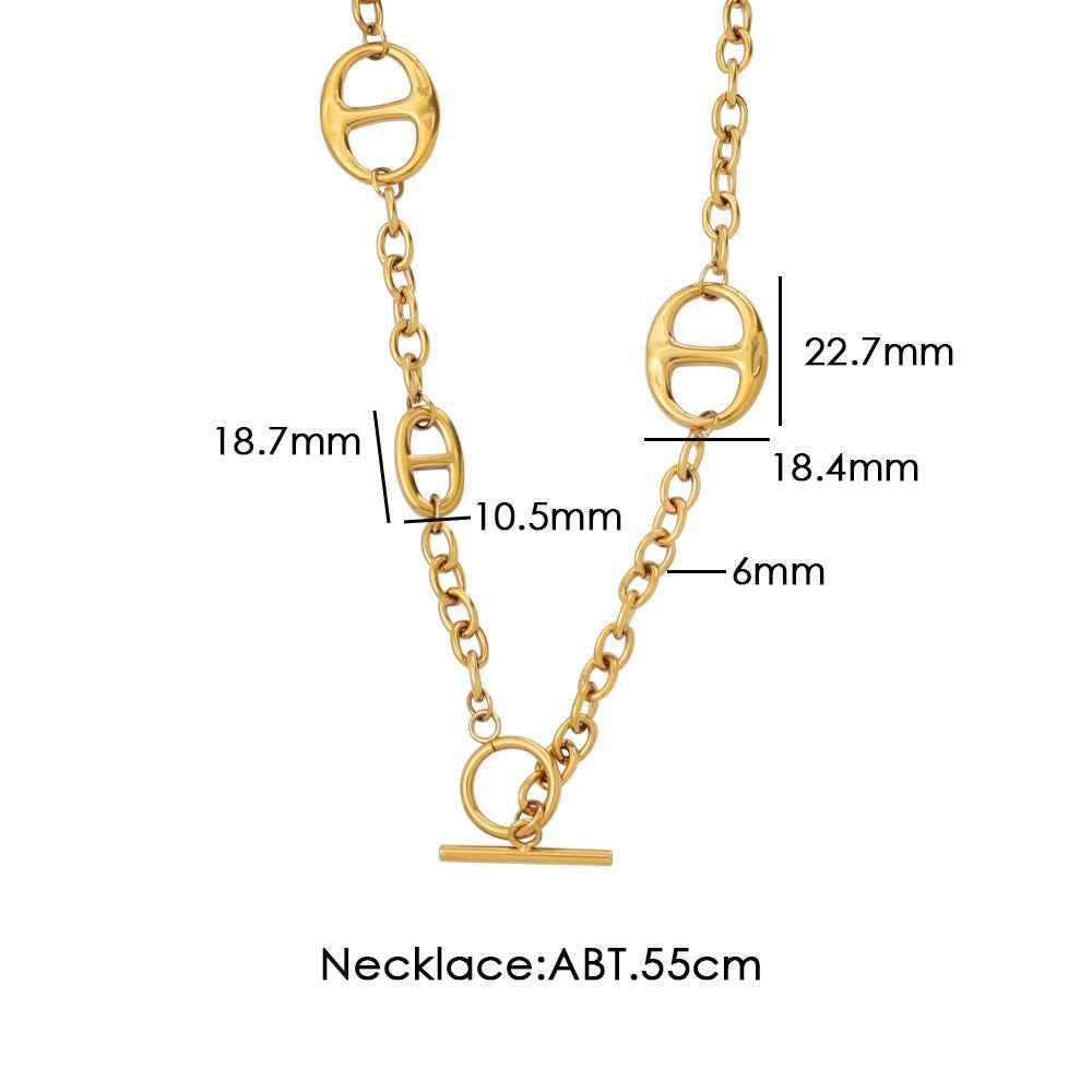 18K gold geometric-shaped necklace, bracelet, and earrings set.