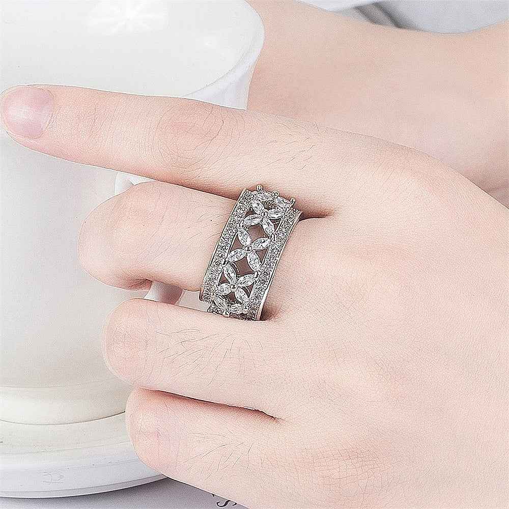 S925 sterling silver ring with full pave-set marquise-cut stones.